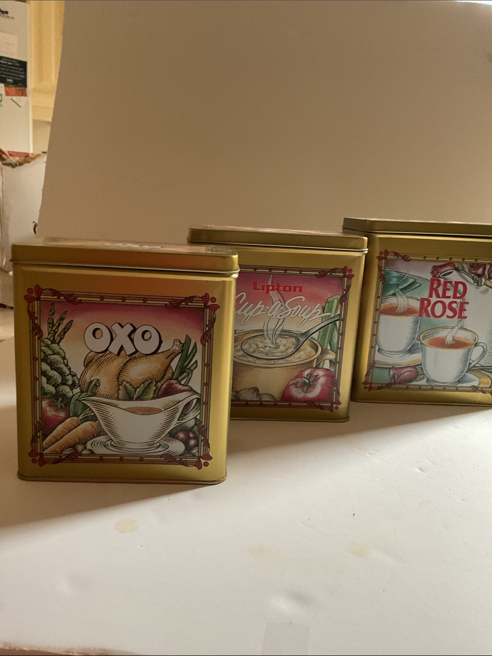 Trio of Vintage Red Rose Tea, OXO and Cup A Soup canisters.